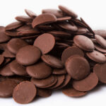 1kg Share Bag - Dark Chocolate Buttons pile