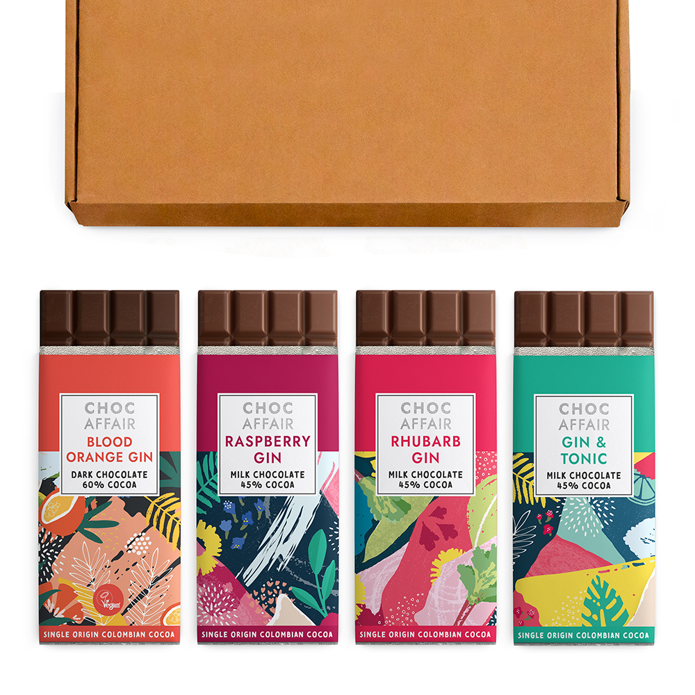 Letterbox friendly box of Blood orange gin, rhubarb gin, gin & tonic and raspberry gin chocolate bars.