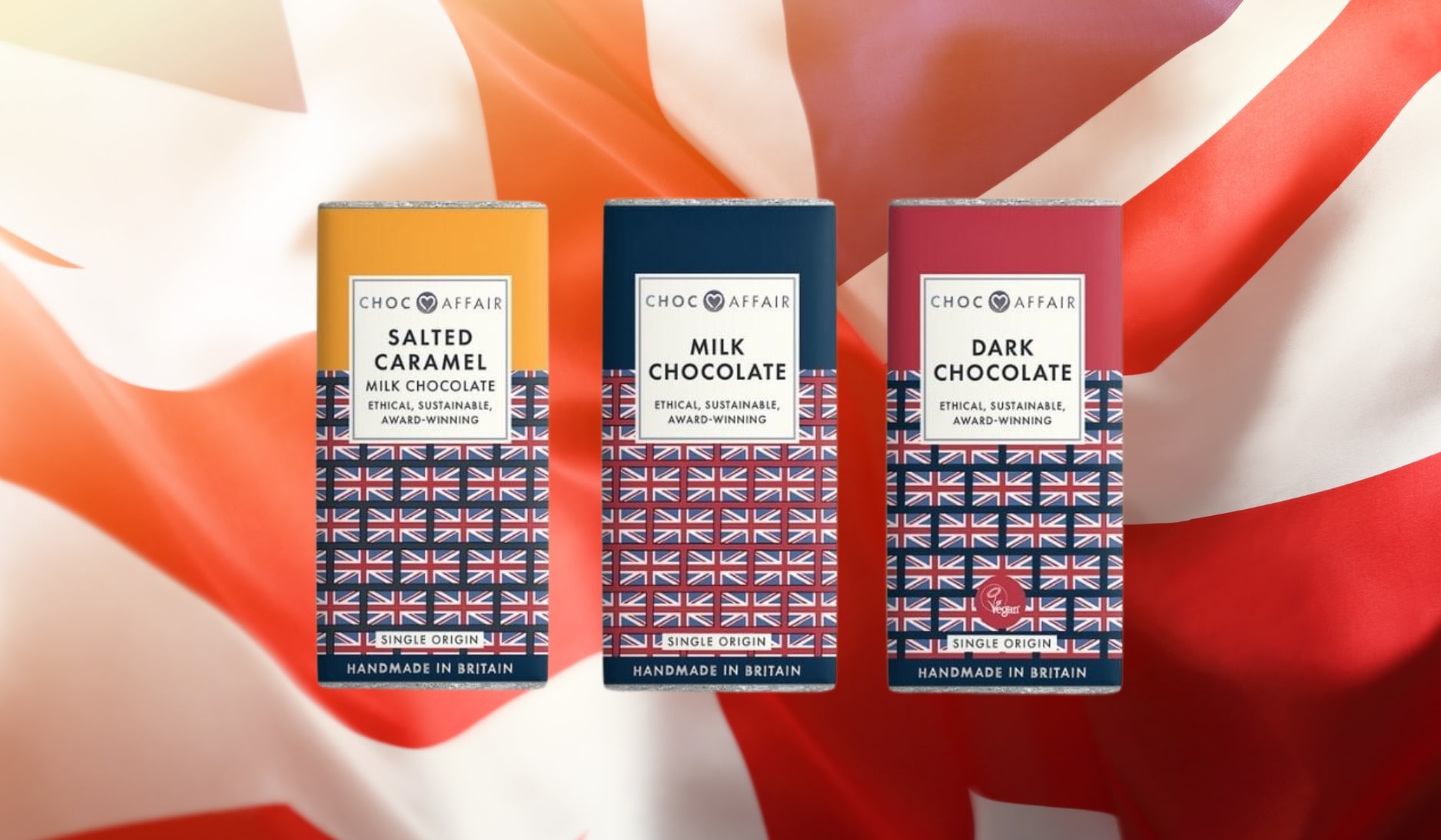 3 chocolate bars in front of a British flag