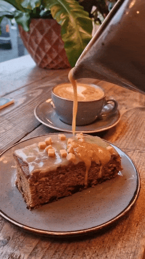 Sticky toffee cake with caramel sauce poured over